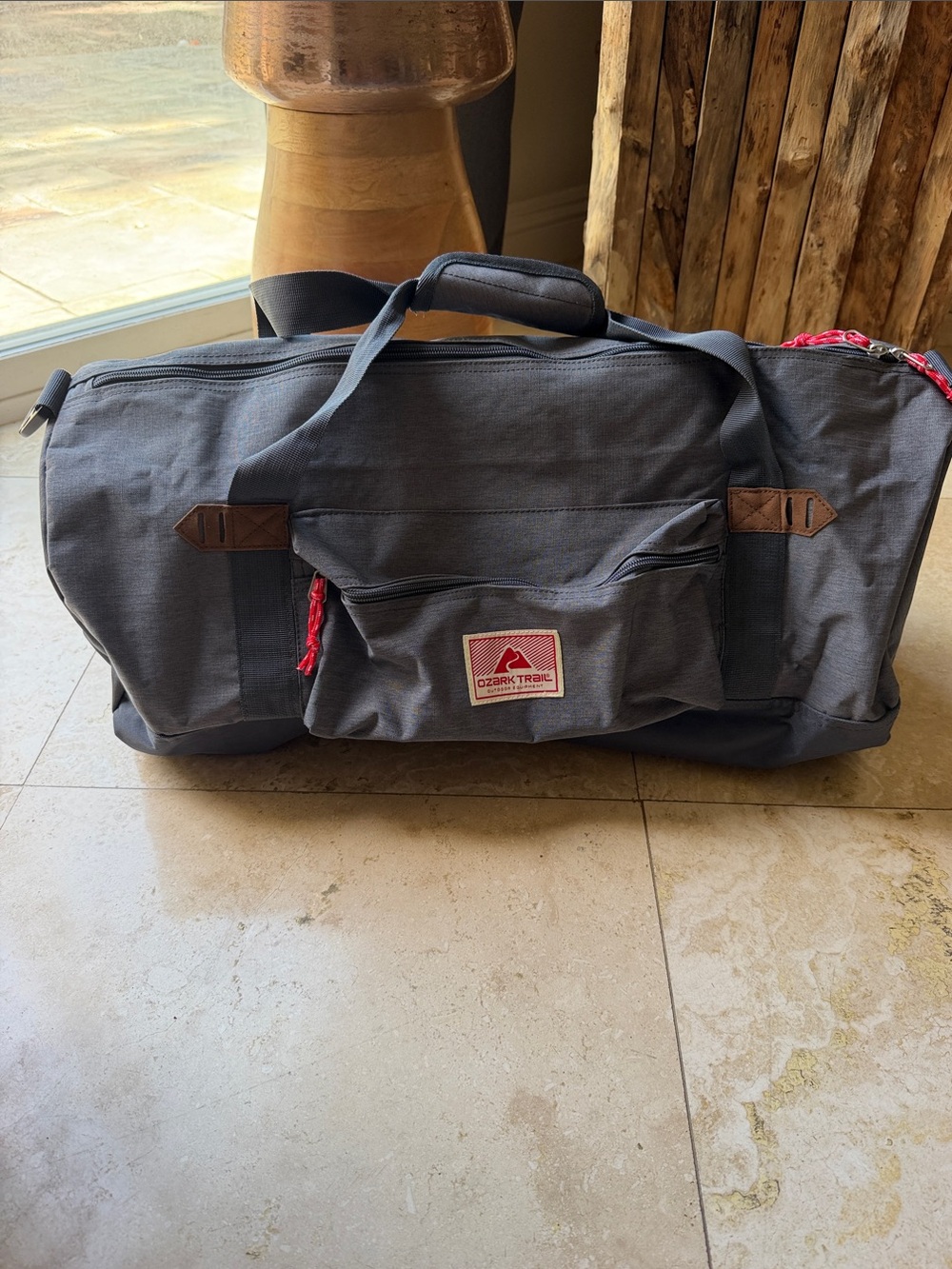 Ozark Trail Charcoal Gray Duffel Bag with Red Accent 25 inches long, 12 in tall